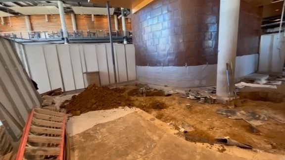Existing floor opened up and the area cleared