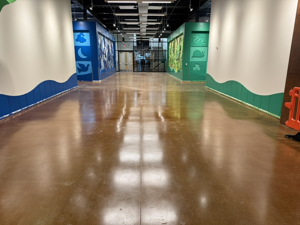 Finished corridor with the polished floor and themed wall graphics